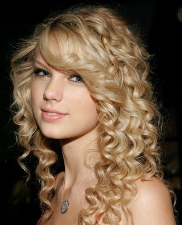 Long blonde curly hairstyle
