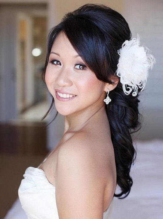 wedding hairstyles to the side with flower