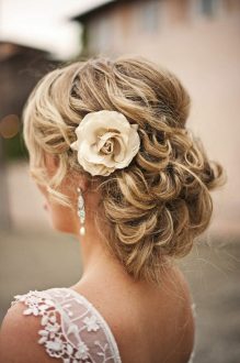 wedding hairstyles with flowers bold and beautiful