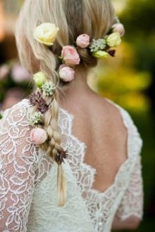 wedding hairstyles with flowers heavy loose pony